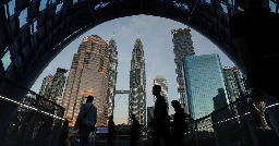 Malaysia halts music festival after same-sex kiss by UK band The 1975
