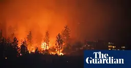 Canada wildfires: thousands told to flee in British Columbia, as drone-flying tourists criticised